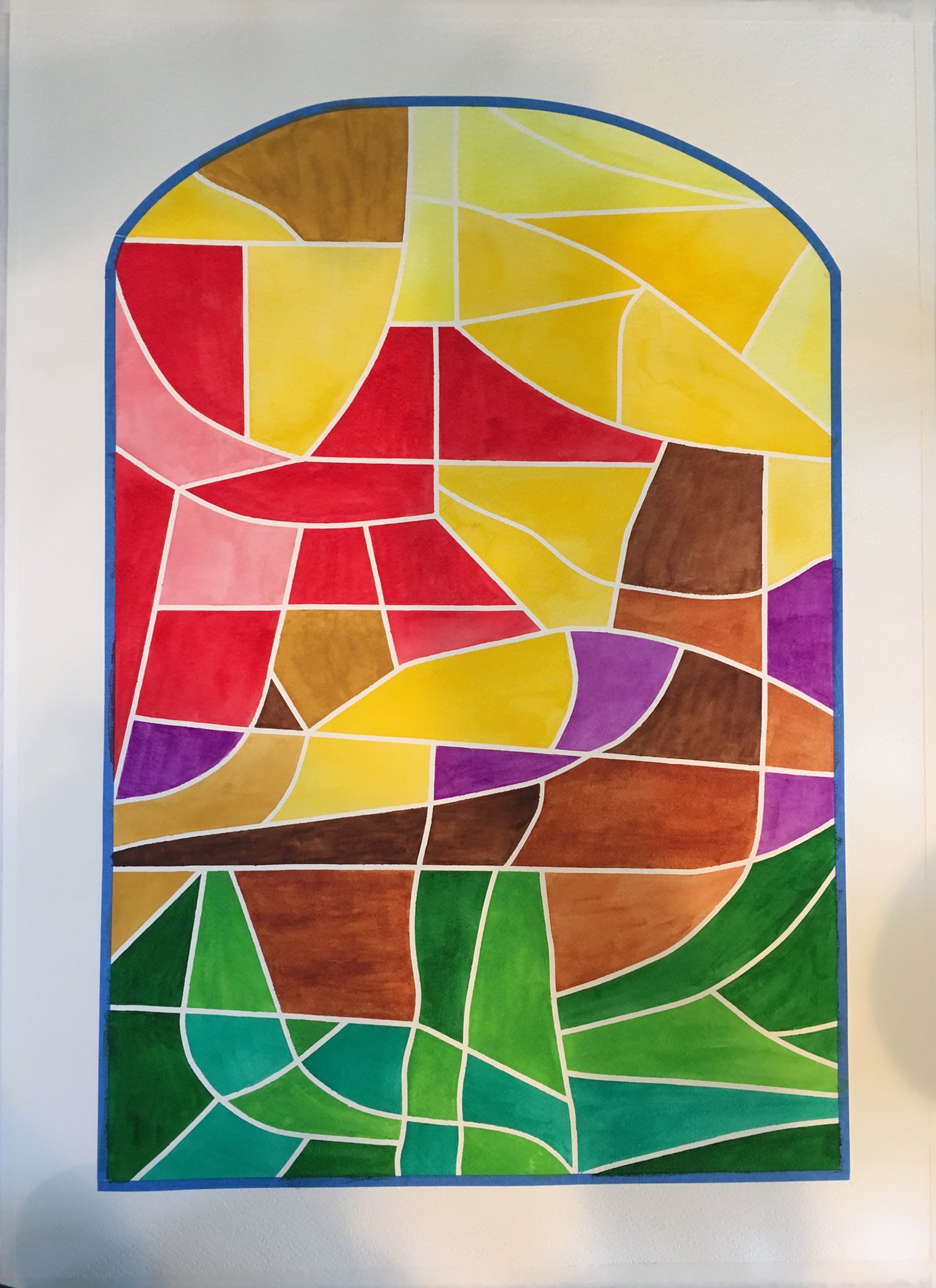 Arched stained-glass window in vivid reds, yellows, purples and greens with white leading